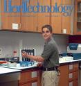 Andrew N. Trigiano, a middle school student, completing an electrophoresis experiment with food dyes.