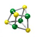 Depicted is a molecular representation of a four iron- four sulfur cluster in which the sulfur is shown in yellow and iron in green.