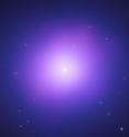 A composite image from NASA's Chandra X-ray Observatory (shown in purple) and Hubble Space Telescope (blue) shows the giant elliptical galaxy NGC 4649. 
By applying a new technique, scientists used Chandra data to measure the black hole at its center to be about 3.4 billion times more massive than the Sun.  The value from this X-ray technique is consistent with a more traditional method using the motions of stars near the black hole. NGC 4649 is now one of only a handful of galaxies for which the mass of a supermassive black hole has been measured with two different methods.