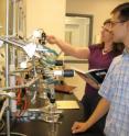 Graduate student Christopher Glein works with Assistant Professor Hilairy Hartnett to assemble testing equipment. Glein is currently the only student involved with the research, but the team anticipates having several more students working on both the experimental/analytical and the thermodynamical/mechanistic aspects of the project.