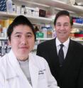 Dr. Michael Norgard (right), chairman of microbiology, and Dr. Zhiming Ouyang, a postdoctoral researcher, have identified a protein that may help give Lyme disease its virulent bite.