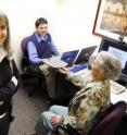 Georgia Tech's School of Psychology chair Fredda Blanchard-Fields (left) and research assistant Daniel Pierce (center) ask study participant Mary Buchanan to fill out a questionnaire before beginning the trial.