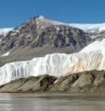 This blood-red stain at the snout of Taylor Glacier in Antarctica is the by-product of unique microbes thriving in a salty ocean-like reservoir beneath the glacier.