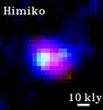 This image of the Himiko object is a composite and in false color. The thick horizontal bar at the lower right corner presents a size of 10 thousand light year.