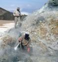 This shows the sampling of volcanic gases in the active crater of Oldoinyo Lengai.