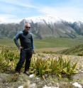 Phil Wannamaker, a geophysicist at the University of Utah's Energy and Geoscience Institute, on New Zealand’s South Island with the Inland Kaikoura Range in the background. New Zealand sits atop one of the youngest "subduction zones" on Earth, where the Pacific Plate of Earth's crust is diving beneath New Zealand, which sits on the Australian Plate. Wannamaker led a study that showed how and where water is released in a young subduction zone so that it helps crack the ground and otherwise pave the way for earthquakes.