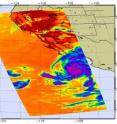 AIRS infrared image from Aug. 31 a 4:59 p.m. EDT shows the icy clouds of powerful Hurricane Jimena about to impact Baja California (bottom right), a fading Tropical Depression Kevin (left at sea), and a trail of pyrocumulus clouds stretching from Los Angeles to New Mexico from the California fires.