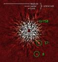 This August 2009 discovery image of GJ 758 B was taken with the Subaru Telescope's HiCIAO instrument in the near infrared, which measures and records differences in heat. Without the special technique employed here (angular differential imaging), the star's glare would overwhelm the light from the planet candidates. The planet-like object, GJ 758 B, is circled as B in the lower right portion of the image. An unconfirmed companion planet or planet-like object, C, can be viewed above B. The star, GJ 758, is located at the center of the image, at the hub of the starburst. The graphic at the top compares the orbital distances of solar system planets.
