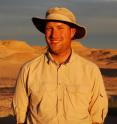 Paleontologist Sterling Nesbitt at Hayden Quarry on Ghost Ranch in northern New Mexico. Nesbitt, a post doctoral researcher at the University of Texas at Austin, and his colleagues discovered <I>Tawa hallae</I>, a previously unknown theropod dinosaur.