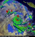 This NASA Tropical Rainfall Measuring Mission  (TRMM) satellite 3-D image shows thunderstorm tops reaching about 9.3 miles high in various sides of Cyclone Laurence (red). The red areas also indicate rainfall at about 2 inches per hour.