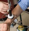 Before scanning, the targeted skin is cooled with a brief burst of compressed air.