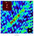 The distant galaxy SMM J2135-0102, shown here in 870-micron observations by the Submillimeter Array, has been gravitationally lensed by a foreground galaxy cluster. The galaxy's light is magnified and bent by gravity to produce mirror images of each of four star-forming regions (labeled A through D). If the galaxy were seen undistorted, it would appear like the inset at upper left. Regions A and D are separated by less than 6,000 light-years. The inset at lower right shows the resolution of the SMA image.