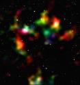 This image shows a smoothed reconstruction of the total (mostly dark) matter distribution in the COSMOS field, created from data taken by the NASA/ESA Hubble Space Telescope and ground-based telescopes. It was inferred from the weak gravitational lensing distortions that are imprinted onto the shapes of background galaxies. The color coding indicates the distance of the foreground mass concentrations as gathered from the weak lensing effect. Structures shown in white, cyan and green are typically closer to us than those indicated in orange and red. To improve the resolution of the map, data from galaxies both with and without redshift information were used.

The new study presents the most comprehensive analysis of data from the COSMOS survey. The researchers have, for the first time ever, used Hubble and the natural "weak lenses" in space to characterise the accelerated expansion of the universe.