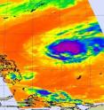 NASA's Aqua satellite captured cold thunderstorm cloud tops (purple) in the center of Tropical Storm Omais in this infrared image of March 25 at 12:41 a.m. EDT. Omais has doubled in size overnight.