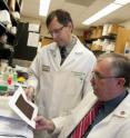 Evan Kharasch, M.D., Ph.D., (left) and Jerry Morrissey, Ph.D., in the lab where they discovered that two key proteins are elevated in the urine of patients with the most common forms of kidney cancer, and the findings may be used to develop a screening test for the early diagnosis of kidney cancer.