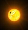 This is an artist's conception of an exoplanet in a retrograde orbit.