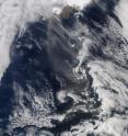 The MODIS instrument on NASA's Terra satellite captured a visible image of the ash plume (brown) drifting south and east from Eyjafjallajökull volcano in Iceland at 11:55 UTC (7:55 a.m. EDT).