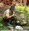 Valter Weijola studies lizards on the island of Sanana with <I>Varanus obor</I>.