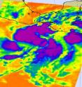 NASA's Aqua satellite infrared image on May 27 at 1:35 a.m. EDT showed System 90E with four areas of strong thunderstorms with very high, cold cloud tops (purple) around the center of circulation.