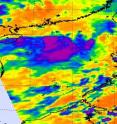 NASA's Aqua satellite infrared image on May 27 at 1:35 a.m. EDT shows System 93W as a comma-like area of showers and thunderstorms. There are two areas of strong thunderstorms with very high, cold cloud tops (purple) east of the center of circulation.