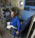 Paul DeMott, Senior Research Scientist/Scholar with the Colorado State University Atmospheric Chemistry Group, in an NCAR C-130 that assisted in his research on ice cloud nuclei.