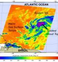 This infrared image from the AIRS instrument on NASA's Aqua satellite was taken on June 14 at 04:29 UTC (12:29 a.m. EDT). There are some high, cold thunderstorms (purple -74F/-58C/215 Kelvin) in some of the areas of convection (blue)/clouds. The deep orange false-color of the ocean surface is about 80F (300 Kelvin), warm enough to support tropical cyclone development.