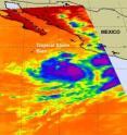 NASA's Aqua satellite captured an infrared image of Tropical Storm Blas on June 17 at 20:41 UTC (4:41 p.m. EDT), and it showed two areas of very high, frigid clouds (purple) in the northeastern and eastern areas of the storm.