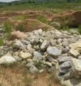 These are streamlined islands sculpted by the flood and large boulders transported by the flood.