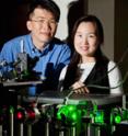 Illinois physics professor Taekjip Ha and graduate student Jeehae Park used fluorescence resonance energy transfer to study how an important DNA enzyme regulates damages sections of DNA. The red and green fluorescent dyes allow them to track a single enzyme's activity.