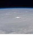 Photographed by an Expedition 24 crew member on the International Space Station, this is an oblique view of the eye (just above center frame) of Hurricane Earl (at this time a category 4), centered just north of the Virgin Islands near 19.3 north latitude and 64.7 west longitude packing 115-kilometer winds. The photo was taken with a digital still camera using a 35mm lens.