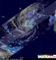 The TRMM satellite captured heavy rainfall (red) around Julia's center on Sept. 12 at 1822 UTC (2:22 p.m. EDT) about 9 hours before she reached tropical storm status. Rain in the red areas was falling at more than 2 inches per hour.