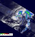 The Tropical Rainfall Measuring Mission satellite passed above Lisa on Sept. 21 at 2309 UTC (7:09 p.m. EDT) and revealed a few areas of moderate to heavy thunderstorms with rain falling at about 2 inches per hour (red) within the storm's circulation. The yellow and green areas indicate moderate rainfall between .78 to 1.57 inches per hour.