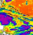 This infrared image of Tropical Depression 16's cloud temperatures was captured on Sept. 28 at 0635 UTC (2:35 a.m. EDT) by the AIRS instrument on NASA's Aqua satellite. The image shows a very large area of highest, coldest cloud tops (colder than -63 Fahrenheit) throughout Tropical Depression 16 (in purple). Tropical Depression 16 is already raining on western Cuba (northern edge).