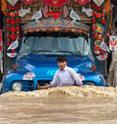 Residents flee the rising floodwaters in Pakistan.