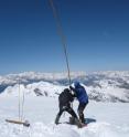 Researchers atop Mount Ortles in the eastern Alps are using a manual hand auger to drill a shallow core for later analysis.