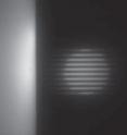 Artificial fluidic nanochannels, like these 30-nm channels shown under fluorescence, mimic the capabilities of transmembrane proteins and are highly prized for advanced technology applications.