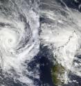The Moderate Resolution Imaging Spectroradiometer (MODIS) instrument that flies aboard NASA's Terra and Aqua satellites captured these two images of Cyclone Bingiza before and after it crossed northern Madagascar on Feb. 13 at 0700 UTC (left) and 14 at 1035 UTC (right), respectively.