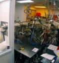 Sabine Freisem, a senior research scientist who has been collaborating with Deppe for the past eight years, works on lasers in their UCF lab.