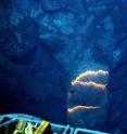 This images shows bands of glowing magma from submarine volcano.