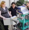 By asking an individual to walk a short distance while saying the months of the year in reverse order in front of this radar system, GTRI research engineers Amy Sharma, Kristin Bing and Jennifer Palmer (left-right) can determine if that person is impaired and possibly suffering from a concussion.