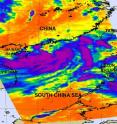 Tropical Depression Haima's (center) cold thunderstorm cloud tops were captured on this infrared image from NASA's AIRS instrument on June 22 at 05:41 UTC (1:41 a.m. EDT). AIRS flies on NASA's Aqua satellite. This image shows most of the strongest thunderstorms (purple) in Haima are south of the center of circulation and none on the northern side. The eastern edge of Tropical Storm Meari is located to the far right near Luzon.