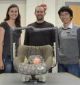 The research team that developed the new infant car seat handle included (L to R): Kinley Taylor, Michael Clamman and Biwen Zhu.