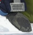 A meteorite is analyzed in the study at its collection site in Antarctica.