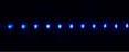 Shown is a linear chain of 29 laser-cooled Th3+ atoms suspended in vacuum by an RF ion trap at the Georgia Institute of Technology. The atoms are near absolute zero temperature and repel each other via Coulomb repulsion because of their like charges.