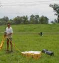 Torbjörn Törnqvist determines the elevation of a GPS-antenna in the Mississippi Delta.