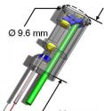 The packaged endoscope is overlaid with the optical system. The circumference is 9.6 millimeters and the length is 23 millimeters.