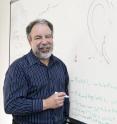 Robert Goldston, a Princeton University professor at the US Department of Energy's Princeton Plasma Physics Laboratory, has developed a model for predicting the outflow of heat during fusion experiments, which may help overcome a key barrier to the fusion process.