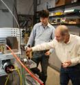 Gregory McLaskey (L) and Steven Glaser examine a tabletop model of a fault at UC Berkeley.