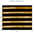 This is an atomic force microscope (AFM) top view of side wall graphene nanoribbons showing their long range order.