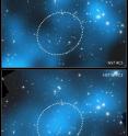 These composite images taken by two different teams using the Hubble Space Telescope show different results concerning the amount of dark matter in the core of the merging galaxy cluster Abell 520. 

Dark matter is an invisible form of matter that astronomers believe is the underlying gravitational "glue" that holds galaxies together. 

In the top image observations of the cluster, taken by D. Clowe with the Advanced Camera for Surveys mapped the amount of dark matter in Abell 520.

It reveals an amount of dark matter astronomers expect based on the number of galaxies in the core. The dark-matter densities are marked in blue, and the dotted circle marks the dark-matter core. The map is superimposed onto visible-light images of the cluster. 

In the bottom image a second team, led by James Jee, used the Wide Field Planetary Camera 2 to find an unusual overabundance of dark matter in the cluster’s core, denoted by the bright blue color at image center.  The observation was surprising because astronomers expect that dark matter and galaxies should be anchored together, even during a collision between galaxy clusters. 

This discrepancy between the two results requires further observation and analysis, say researchers.
The two dark-matter maps were made by detecting how light from distant objects is distorted by the galaxy clusters, an effect called gravitational lensing.

Abell 520 is located 2.4 billion light-years away.